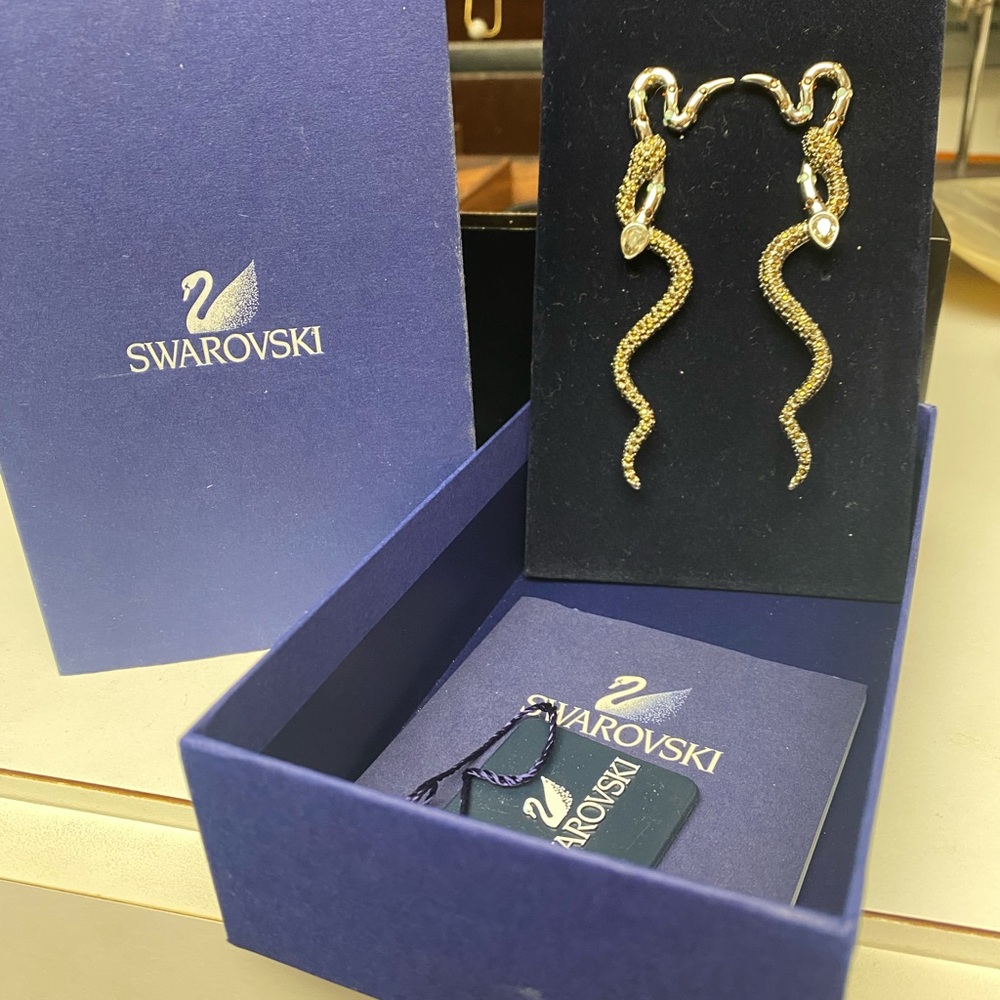 Limited edition Swarovski serpent earrings.